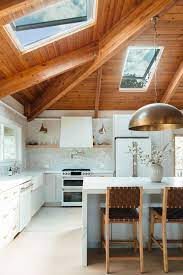 Beautiful kitchen enhanced by natural light of skylight